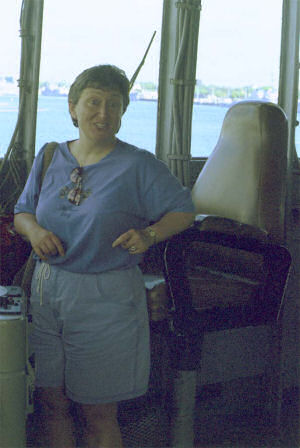 Sandra on the bridge of the battleship USS Missouri.